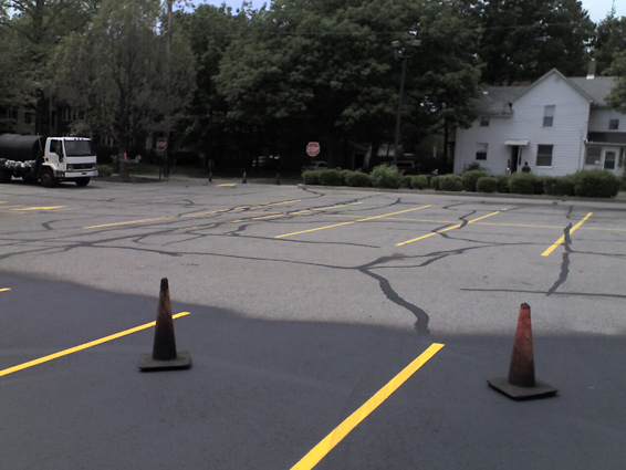 Parking Lot Seal Coating in progress in Cuyahoga County